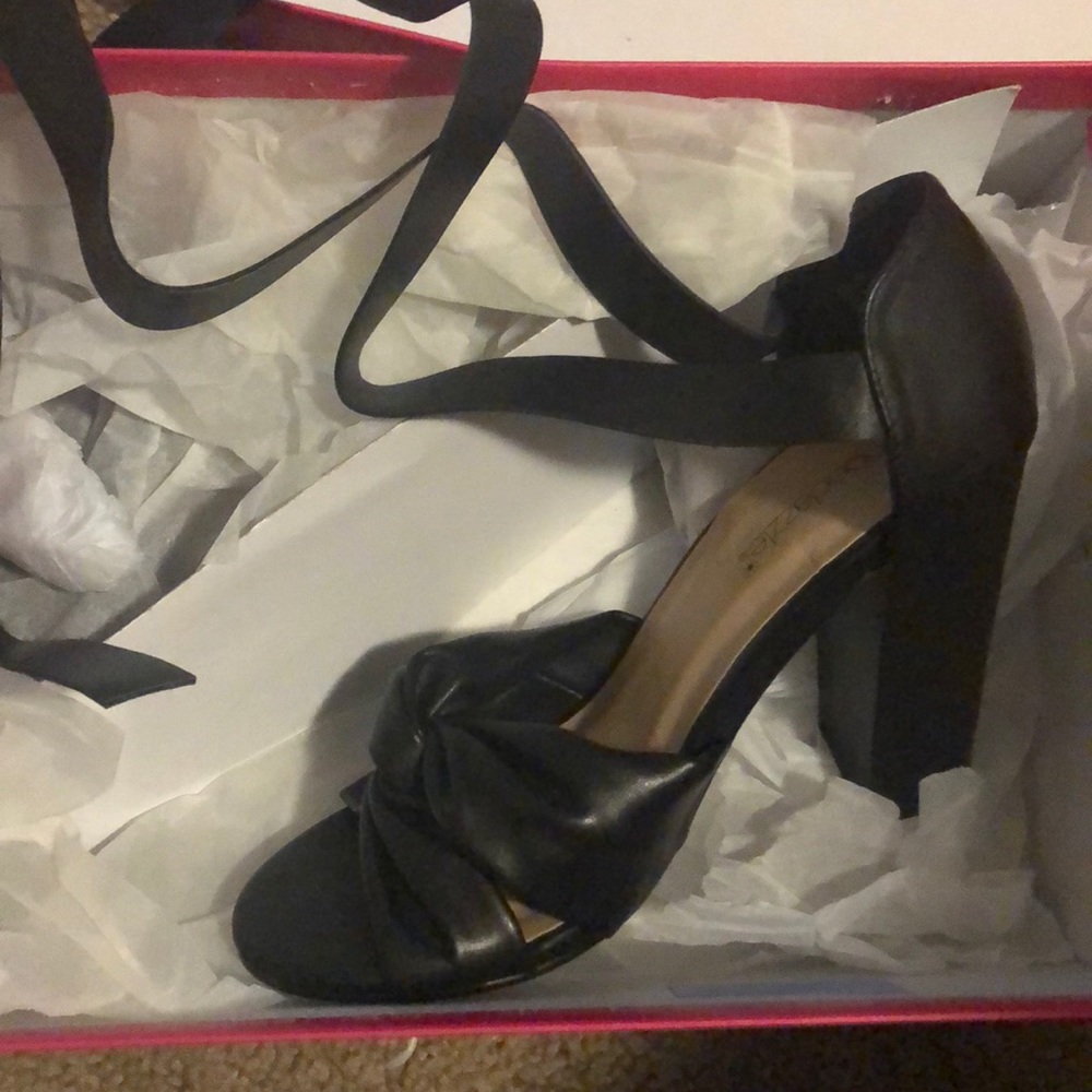 Black strappy heel.
